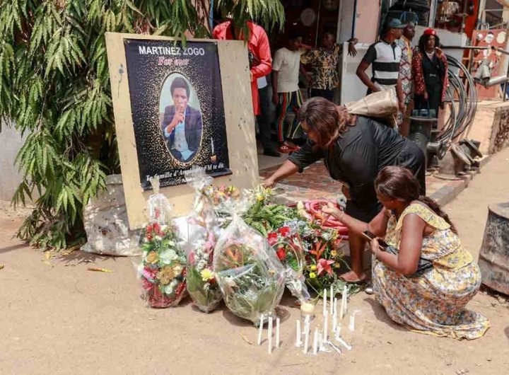 Mourners place a candles and flowers in the courtyard of Radio Amplitude FM, during a tribute ceremony for journalist Martinez Zogo, in the Elig Essono district of Yaounde on January 23, 2023. - A popular Cameroon radio journalist who had been missing following what a media rights group called an abduction has been found dead, his employer and police said on January 22, 2023.
Martinez Zogo was managing director of Yaounde-based private radio station Amplitude FM and the star host of a popular daily programme, Embouteillage (Gridlock).
On the air, the 51-year-old regularly tackled cases of corruption, not hesitating to question important personalities by name. (Photo by Daniel Beloumou Olomo / AFP)